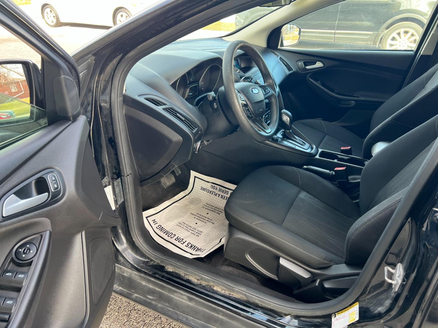 2018 Shadow Black Ford Focus SE Sedan (1FADP3FE7JL) with an 1.0L L3 engine, located at 1633 W Kimberly, Davenport, IA, 52806, (563) 323-5341, 41.559456, -90.598732 - Photo#8